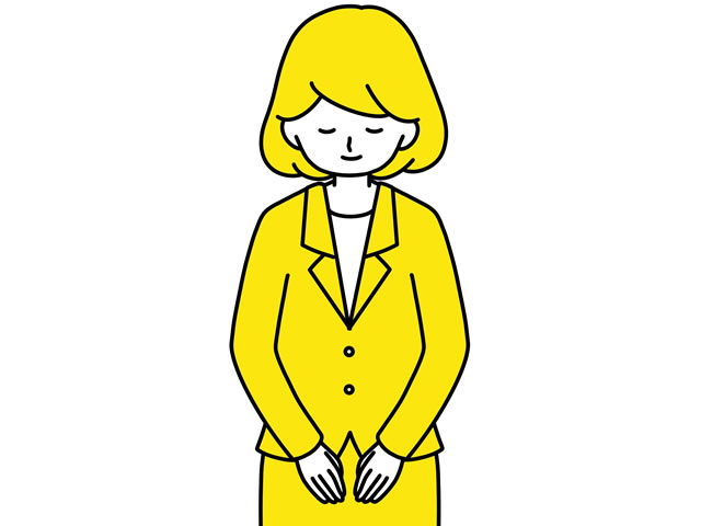 謝罪している女性